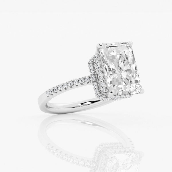 Double hidden halo emerald cut engagement ring in 18k white gold