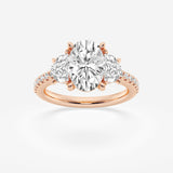 The Three Stone Trilogy ring in 18k rose gold with a oval diamond