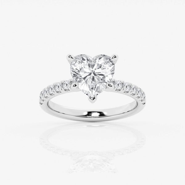 hidden halo heart cut engagement ring with diamond shoulders