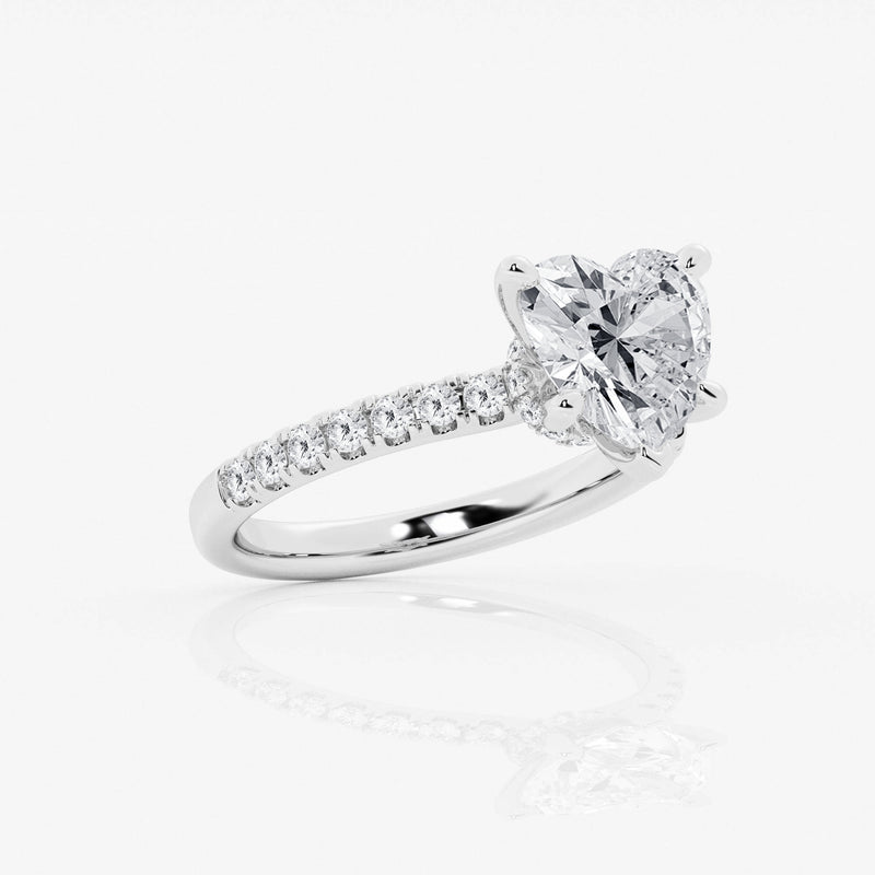 hidden halo heart cut engagement ring with diamond shoulders