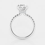 hidden halo heart cut engagement ring with diamond shoulders