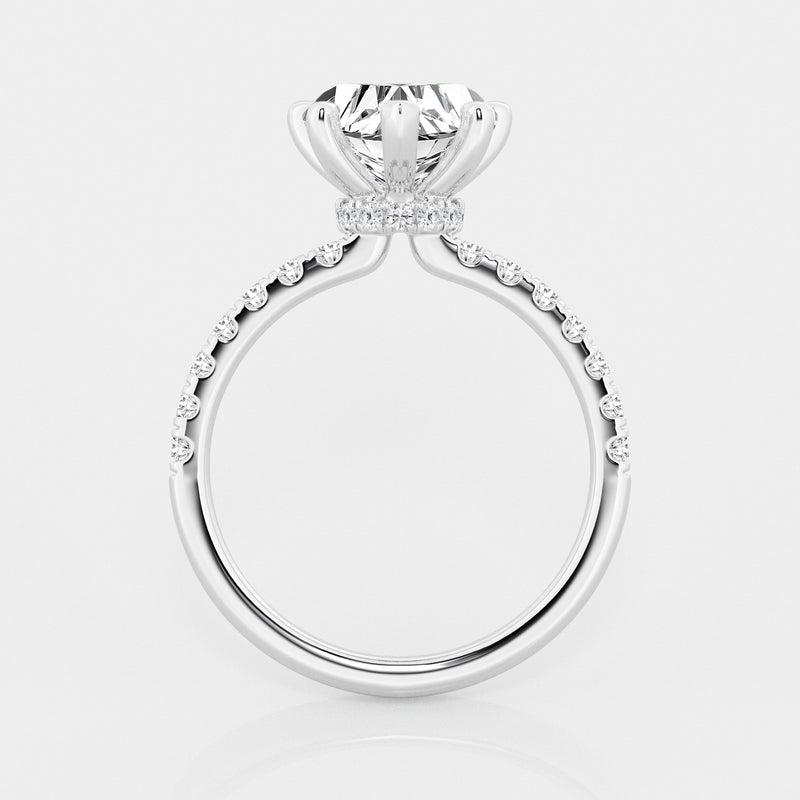 hidden halo heart cut engagement ring with diamond shoulders