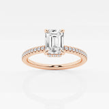 Emerald solitaire engagement ring with hidden diamond halo and pavé band in Rose Gold