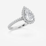 Halo pear engagement ring with pave set shoulders