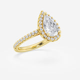 Halo pear engagement ring with pave set shoulders