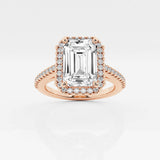 Halo emerald cut engagement ring with pave set diamond shoulders