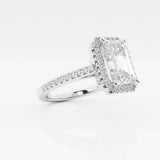 Halo emerald cut engagement ring with pave set diamond shoulders