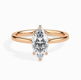 Solitaire marquise cut diamond engagement ring