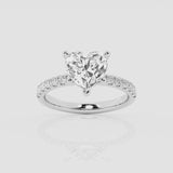 hidden halo heart cut engagement ring with diamond shoulders