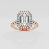 Halo emerald cut engagement ring with pave set diamond shoulders