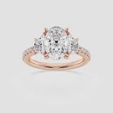 The Three Stone Trilogy ring in 18k rose gold with a oval diamond