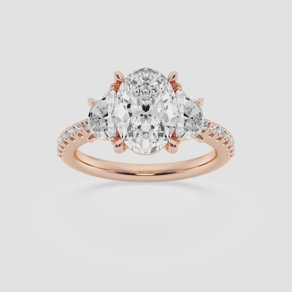 The Three Stone Trilogy ring in 18k rose gold with a oval diamond