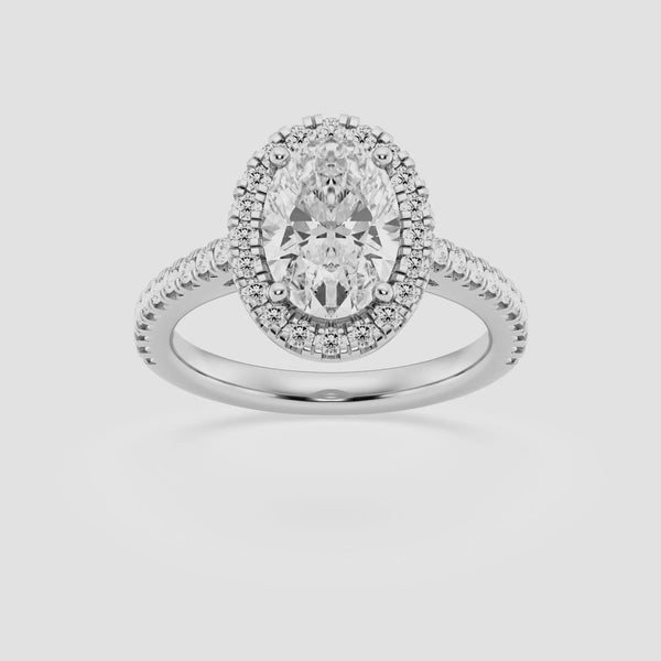 Halo Oval cut engagement ring with diamond shoulders