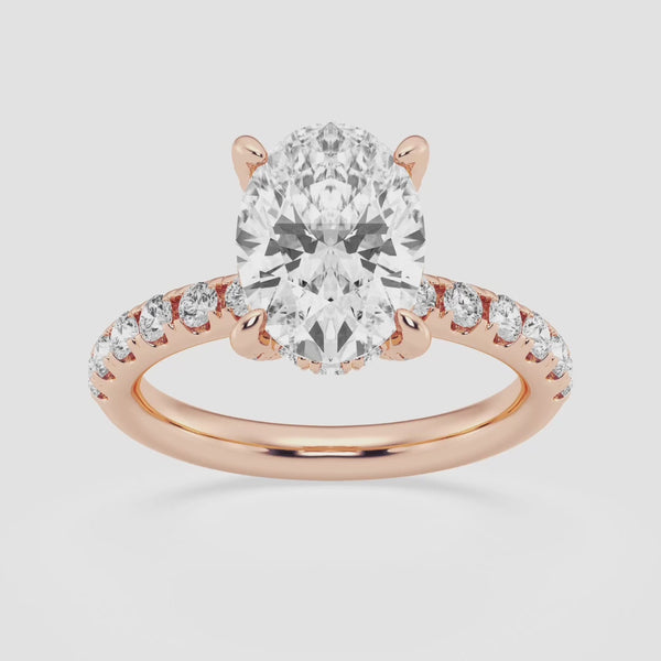Double hidden halo Oval cut engagement ring with diamond shoulders in 18k rose gold