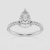 Pear cut engagement ring with diamond shoulders